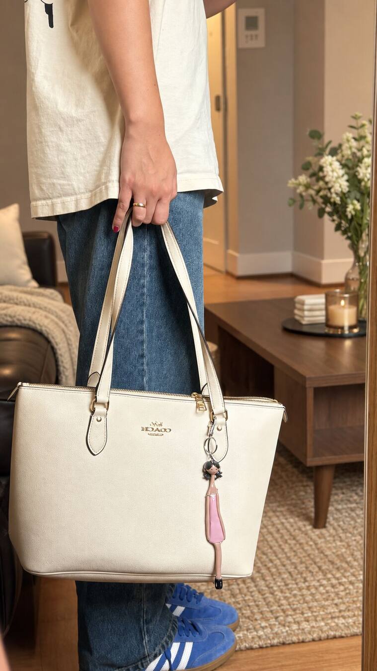 Pay No Mind Mini styled on a cream tote in a softly lit interior