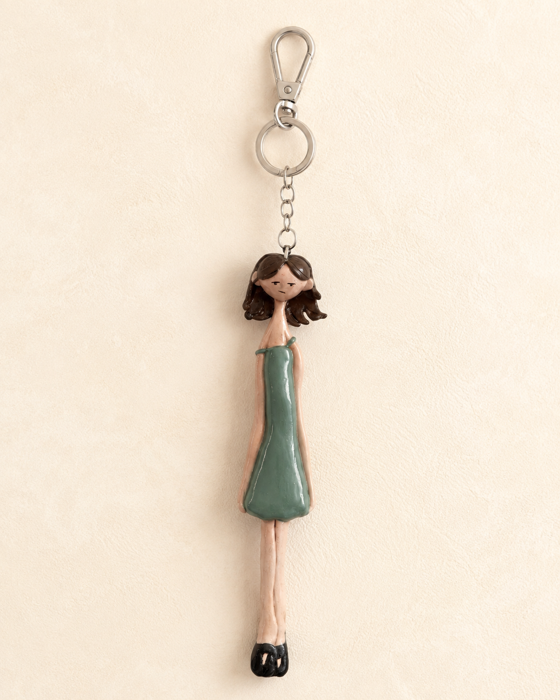 Professional product image of a Pay No Mind Mini keychain